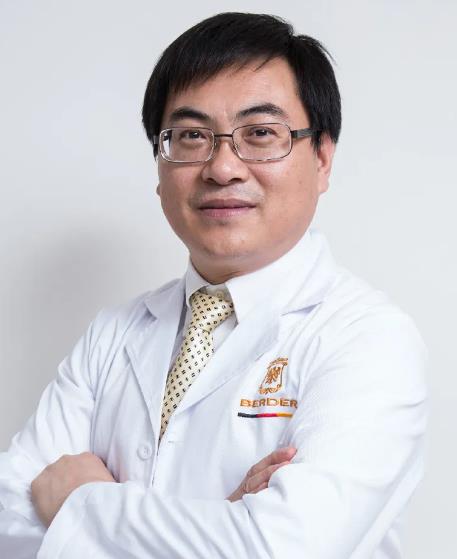 薛啟明